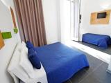 Standard Triple room with garden view