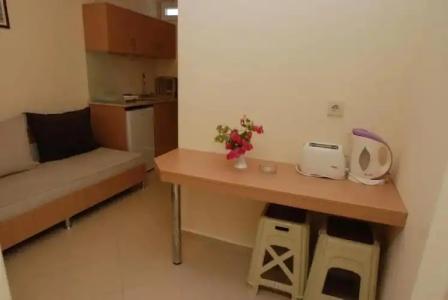 Sun City Apartments & - 107