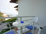 Standard Triple room with partial sea view