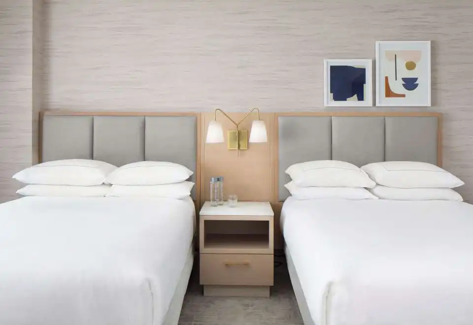 One Bedroom Two Queen Suite With Partial Ocean View