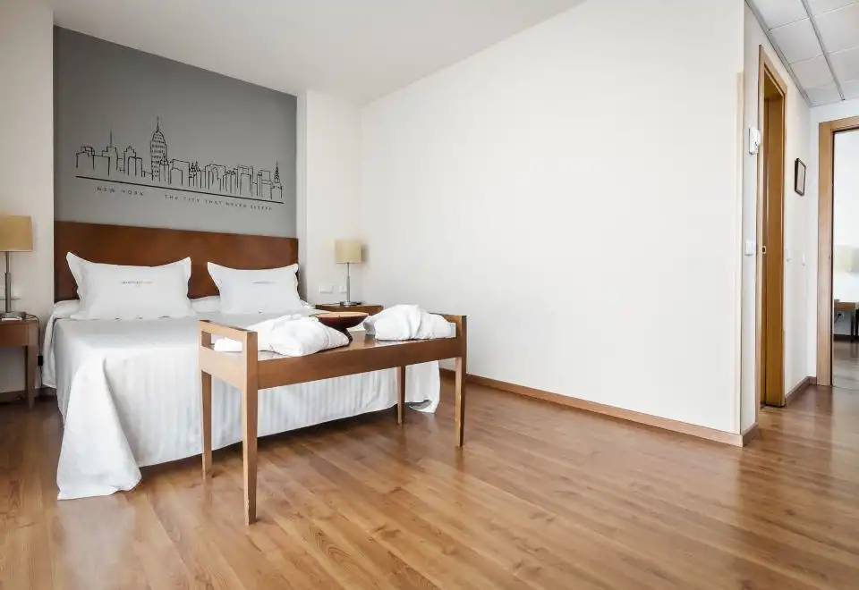 Quadruple Room (2 Adults + 2 Children)