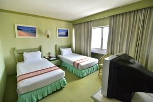 Thumrin Hotel, Trang